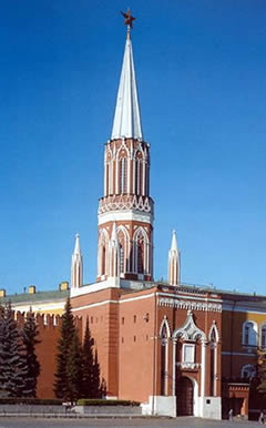 Red brick Gothic tower with spire